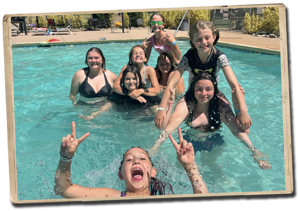 campers being silly in the pool